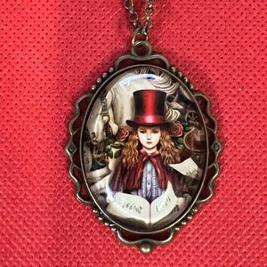 Red Haired Girl in Red Cape and Top Hat Filigree Bronze Tone Pendant Necklace
